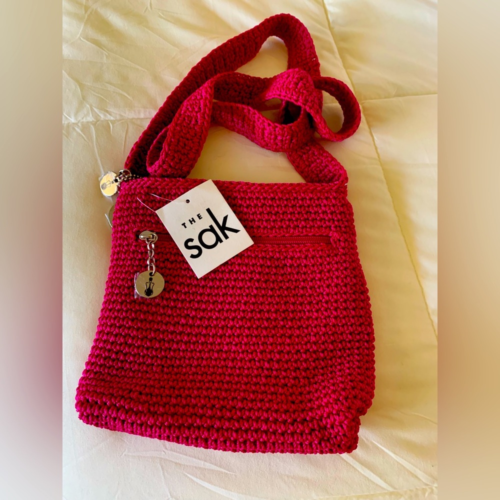 The Sak Pink crocheted Knit Crossbody Bag